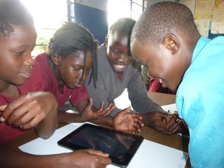 Children working with iPad