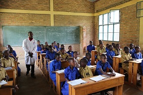 Teacher and students in classroom Rwanda