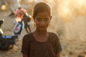 Profile of teenage girl against the sun Pushkar India