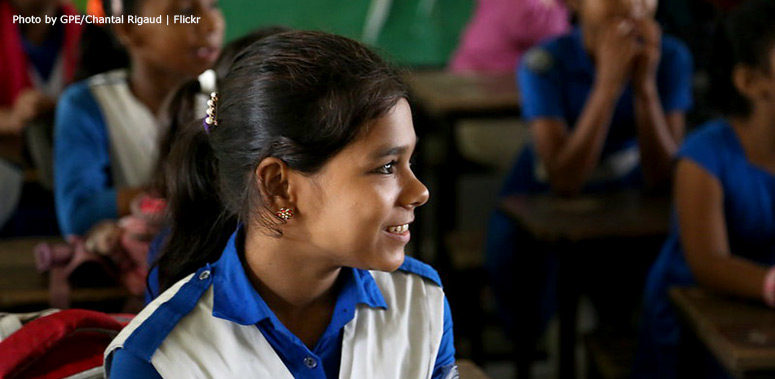 A smiling student in class at Azimpur Government Primary School. Dhaka Bangladesh