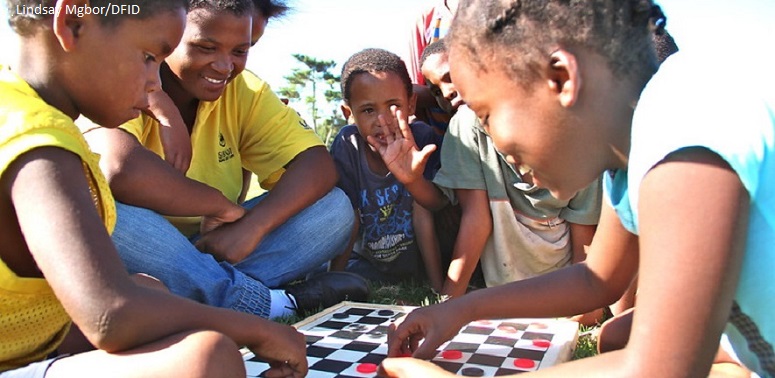 Children playing a board game South Africa