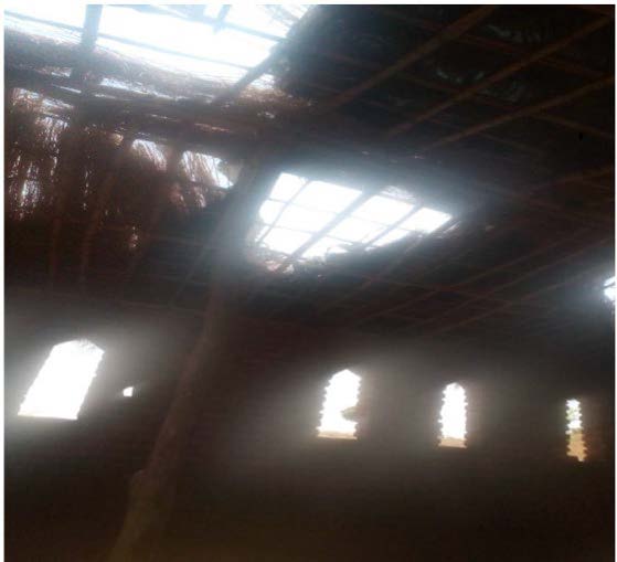 Holes in a classroom ceiling, photographed by a student in Malawi