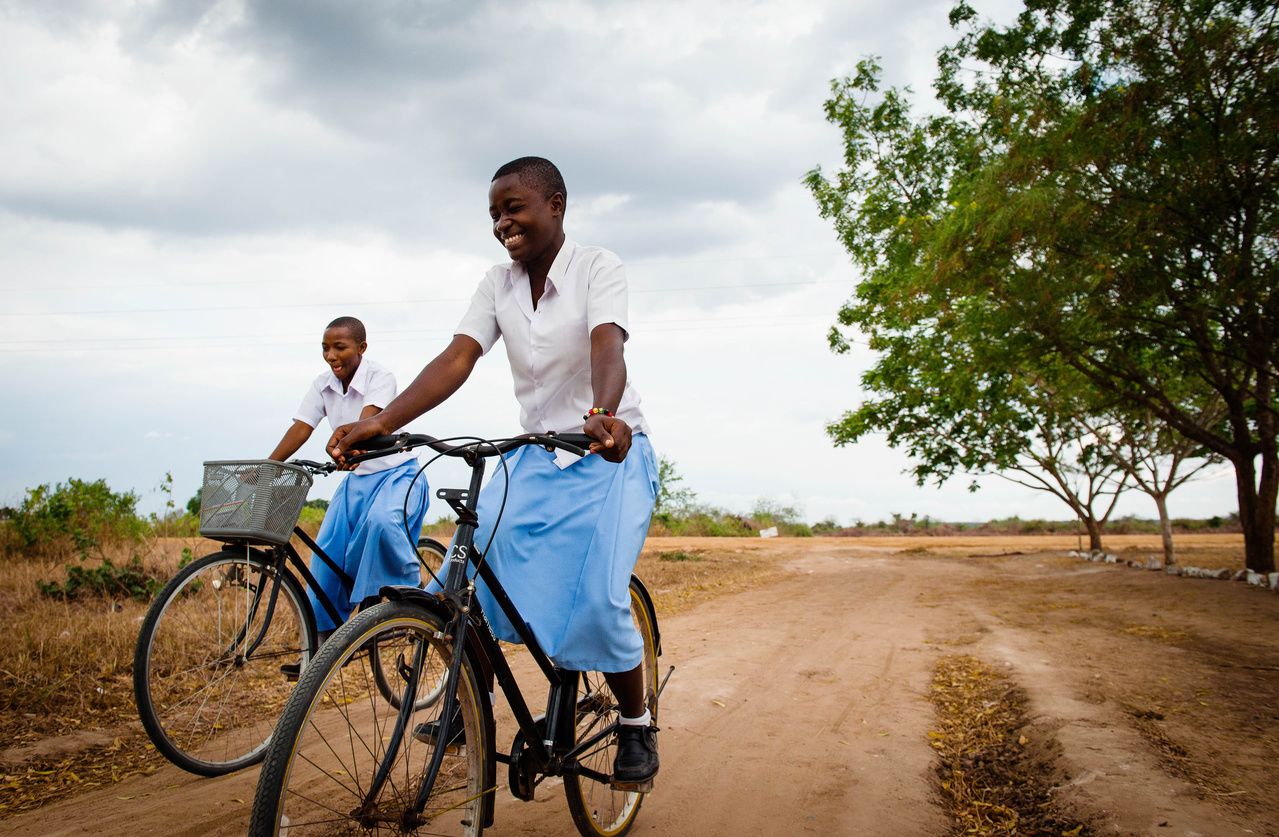 Secondary Scholars Salima and Zawadi travel to school on bicycles