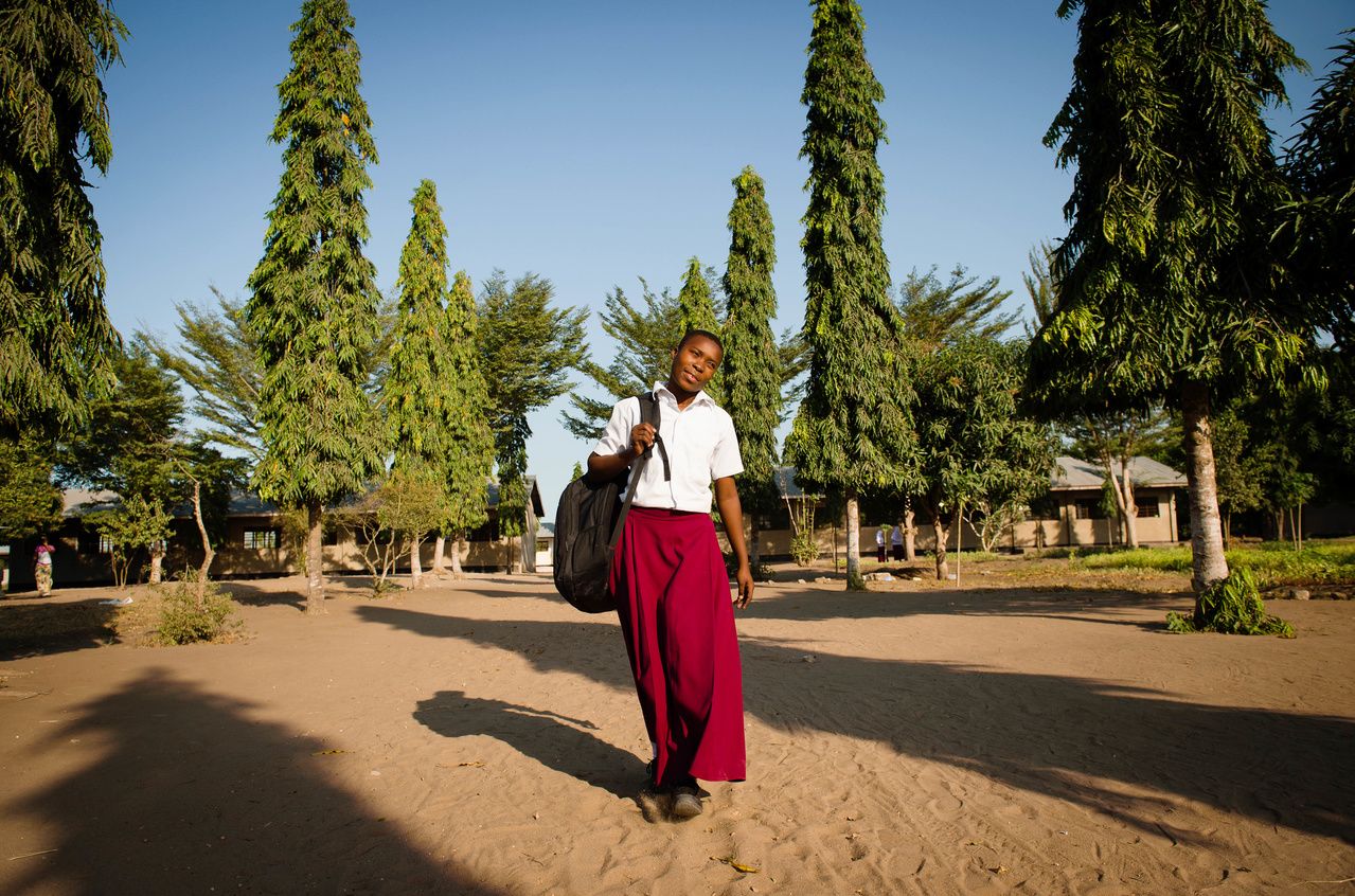    Desderia, pictured at her school, hopes to become a teacher and a community activist.