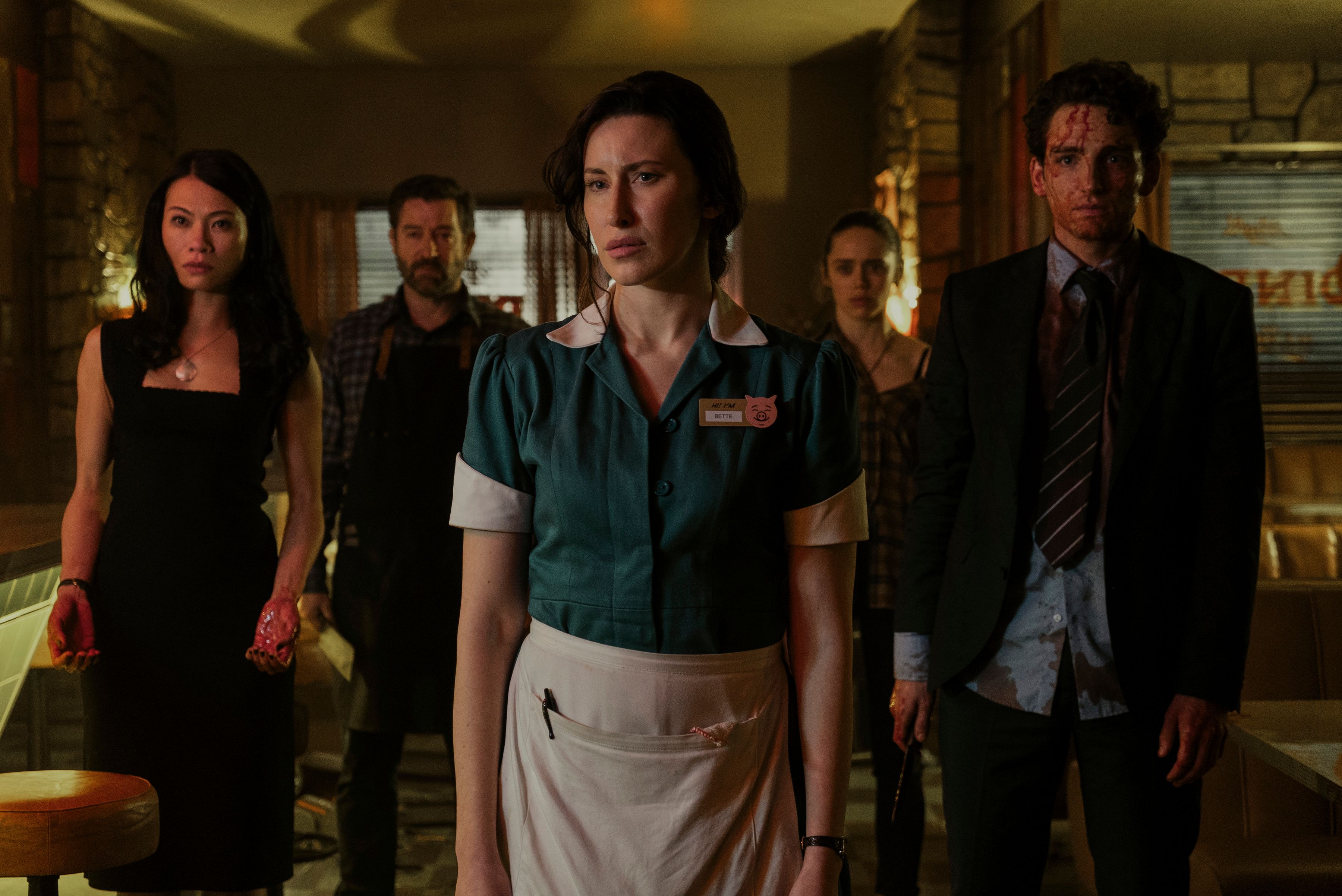 (L to R) Lourdes Faberes as Kate Fletcher, Steven Brand as Marsh Janowski, Emma Duncan as Bette Munroe, Daisy Head as Judy Talbot, Laurie Davidson as Mark Brewer in episode 105 of The Sandman. Cr. Liam Daniel/Netflix © 2022