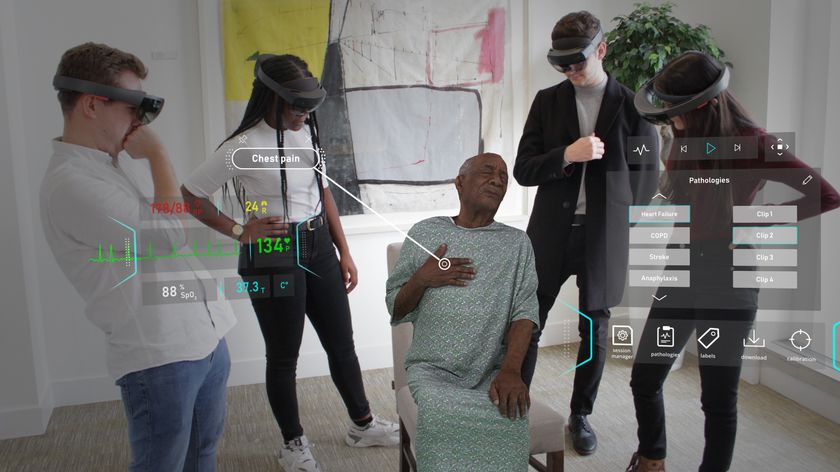 A hologram patient being assessed by medical students
