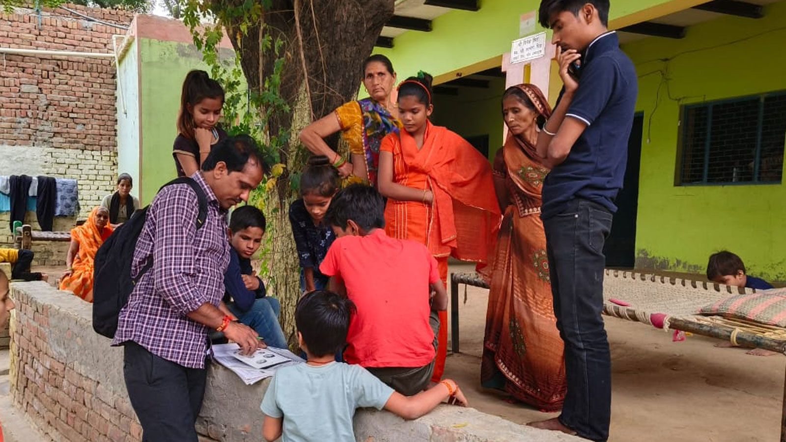 Teacher working in community