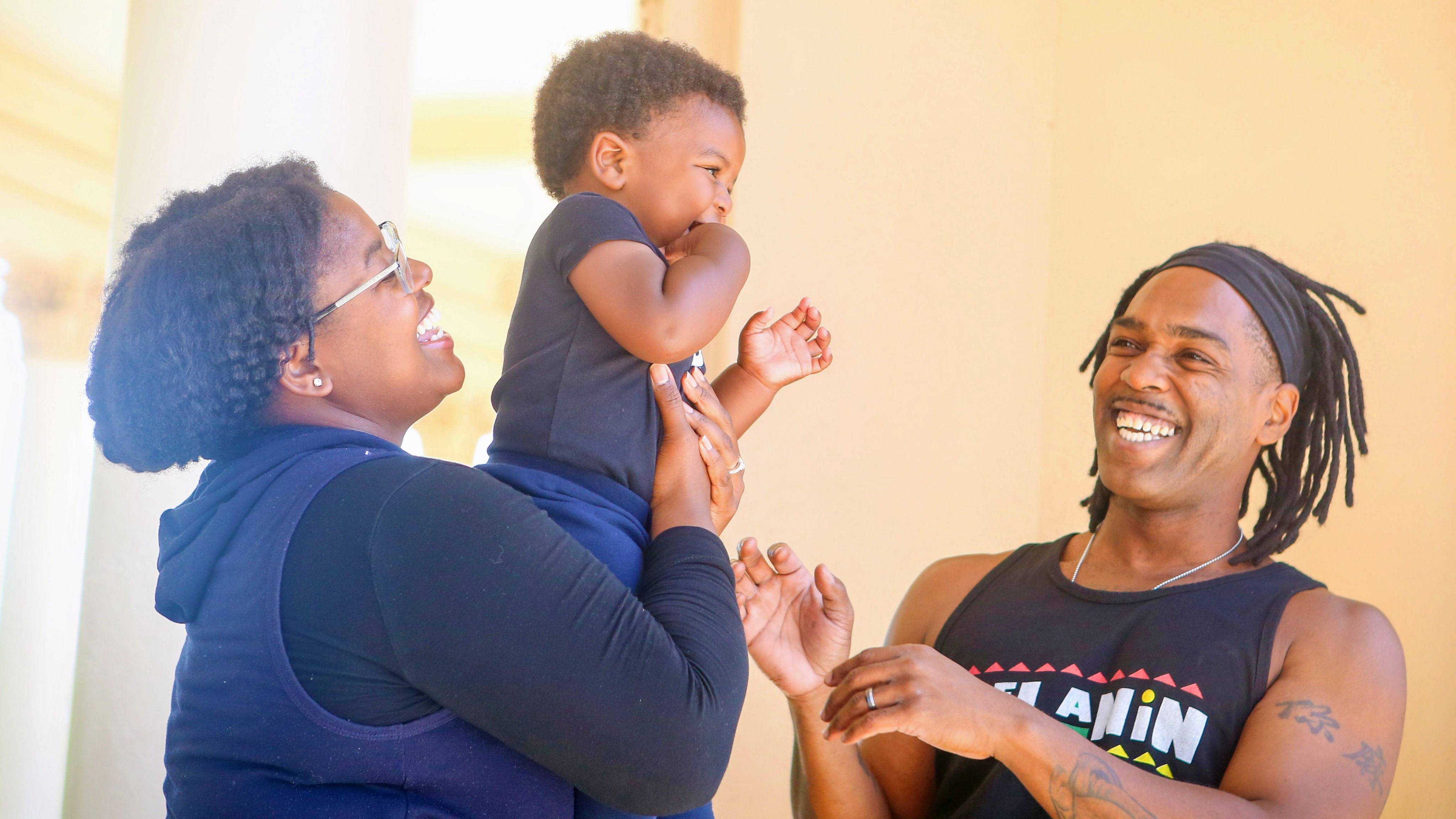 Two parents with baby